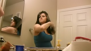 Cute Busty Brunette Amateur Getting Ready In Front of Mirror