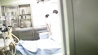 Japanese doctor and his nurse fuck in the medical department