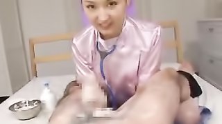 Cute hottie in shiny purple nurse uniform cleans her patient's cock as she pumps it with soap.