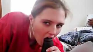 Big tee shirt on girl sucking black cock