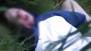 Voyeur tapes a brunette getting missionary fucked in nature