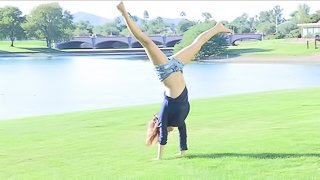 This short-haired cutie strips down to her denim shorts in the park