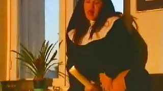 Nun having pleasure